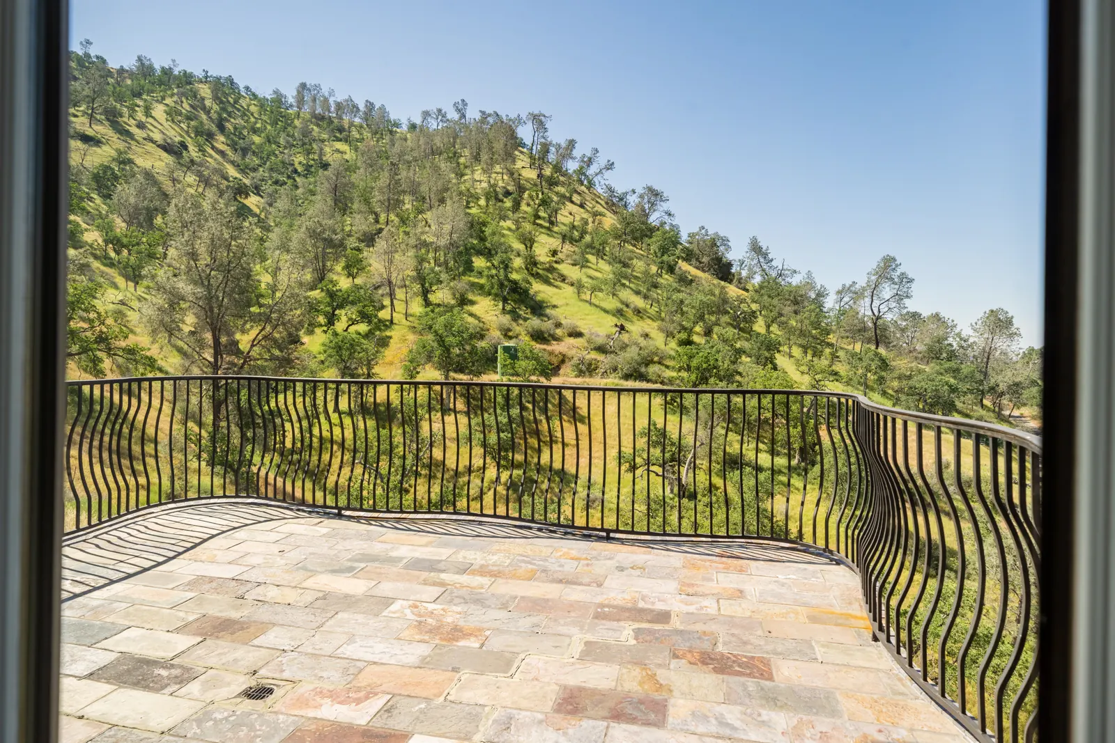 Private balcony looking out over the oak-covered hills