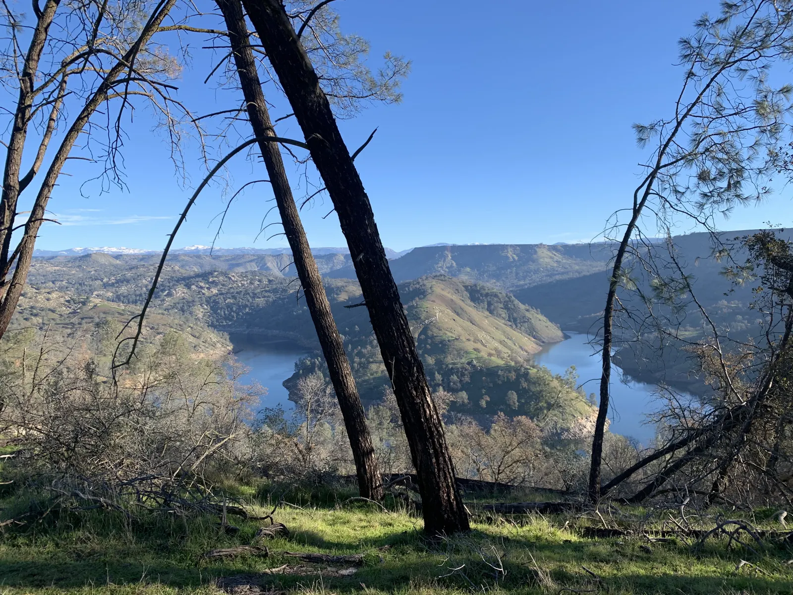 View over Millerton Lake and the Sierra foothills from a hiking trail near the villa